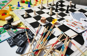 board game pieces, chess, dominoes, checkers, cards
